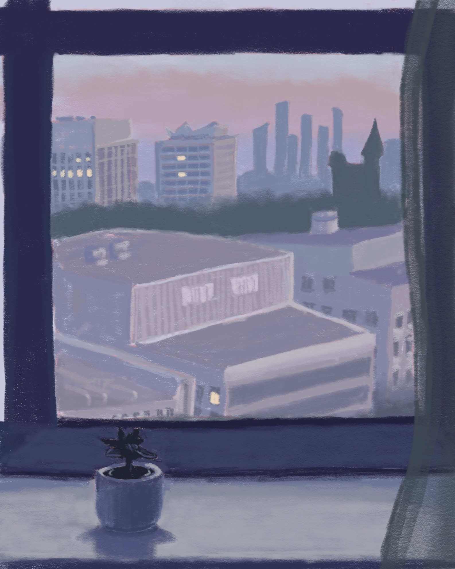 View from a window overlooking a city at dusk